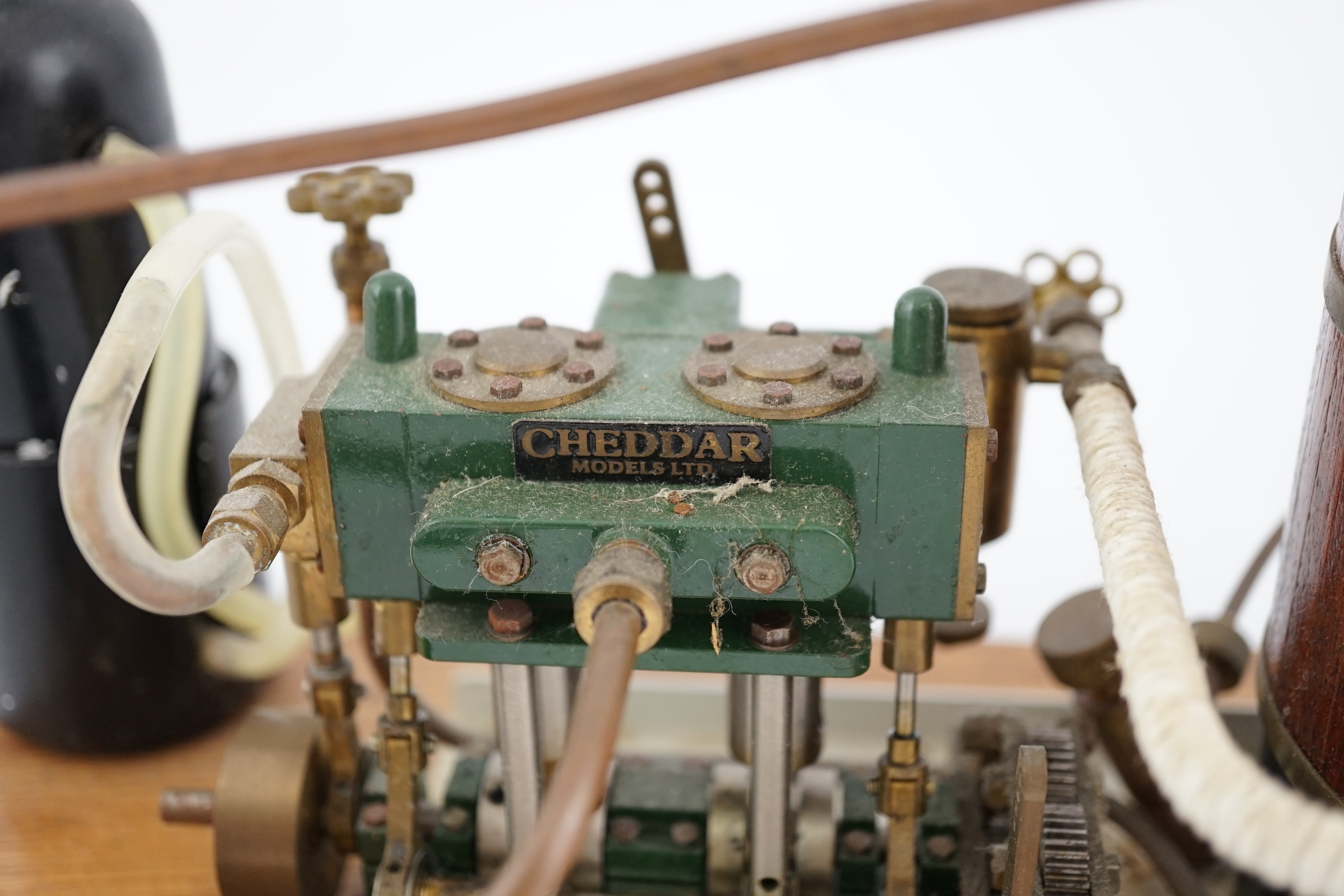 A Cheddar Models Ltd. Proteus steam plant, a gas fired vertical boiler two cylinder marine engine, with a wood clad copper boiler fitted with pressure gauge, water sight glass and safety valve